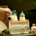 Calentador y esterilizador eléctrico portátil de la botella del brebaje del bebé