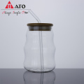 Water glass tumbler with bamboo lid and straw