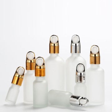 Botellas de suero de suero de la cara de aceite esencial de vidrio esmerilado: 5 ml a 100 ml con tapas de oro y plata