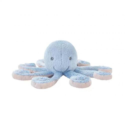 A blue octopus sleeps with a stuffed animal
