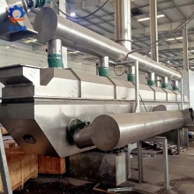 Pengering bed fluida bergetar untuk oksida besi
