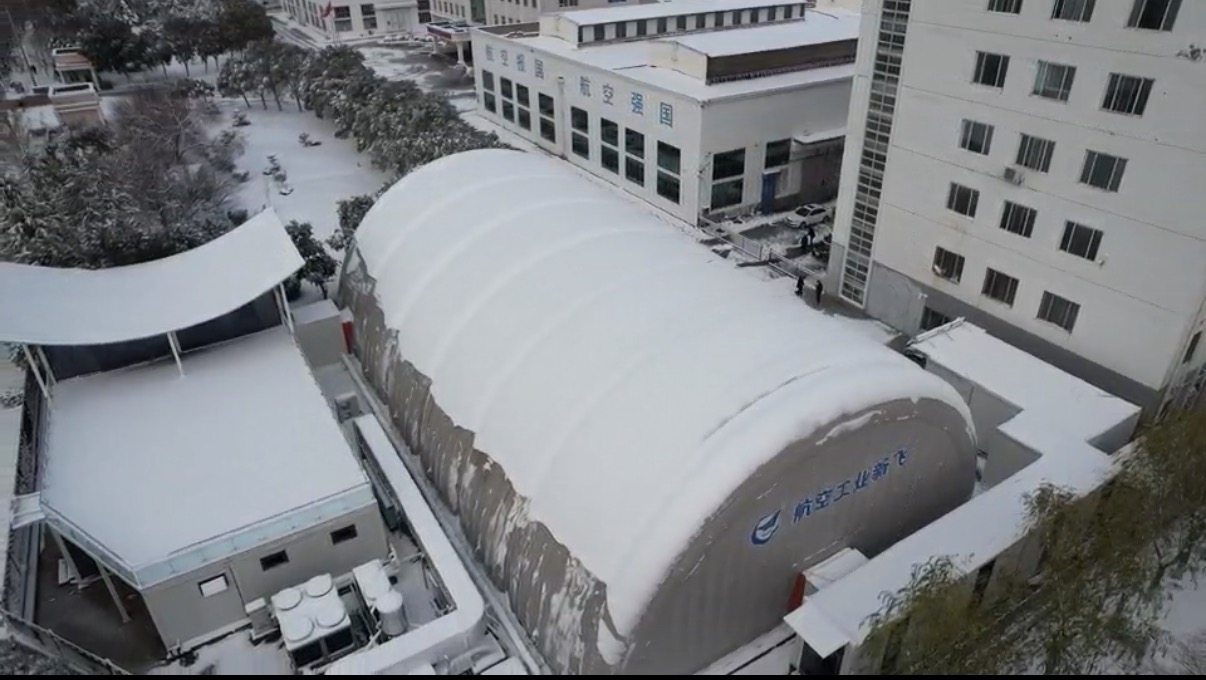 Inflatable structure deployed at an aviation facility in winter
