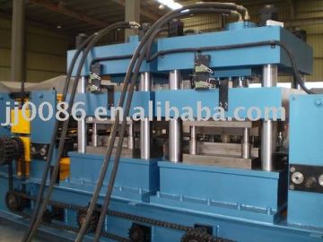 Highway guardrail forming machine
