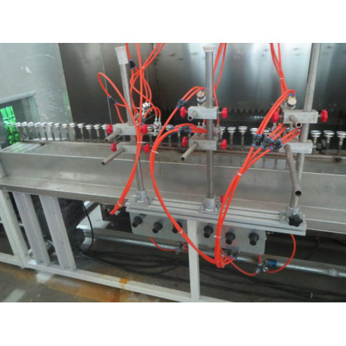 Industrial spray machine with UV dryer