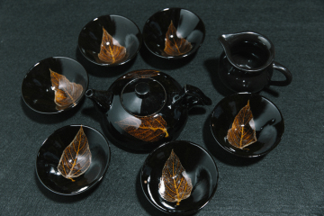 A set of top quality tea set with wood leaves in Jizhou kiln