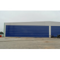 Fast action high speed rolling up hangar door