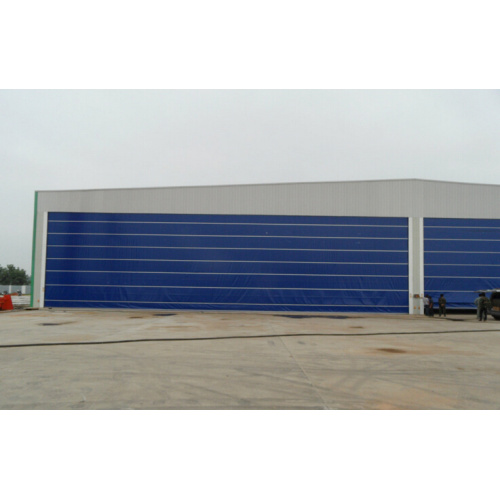 Fast action high speed rolling up hangar door