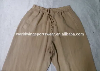 Unisex plain beige with 2 side pockets and drawstring on front Taiji bottoms