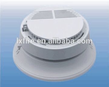 Photoeletric smoke detector with transmitting & receiving base