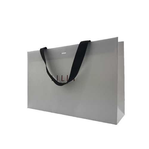 Corrugated paper gift containing shopping bag