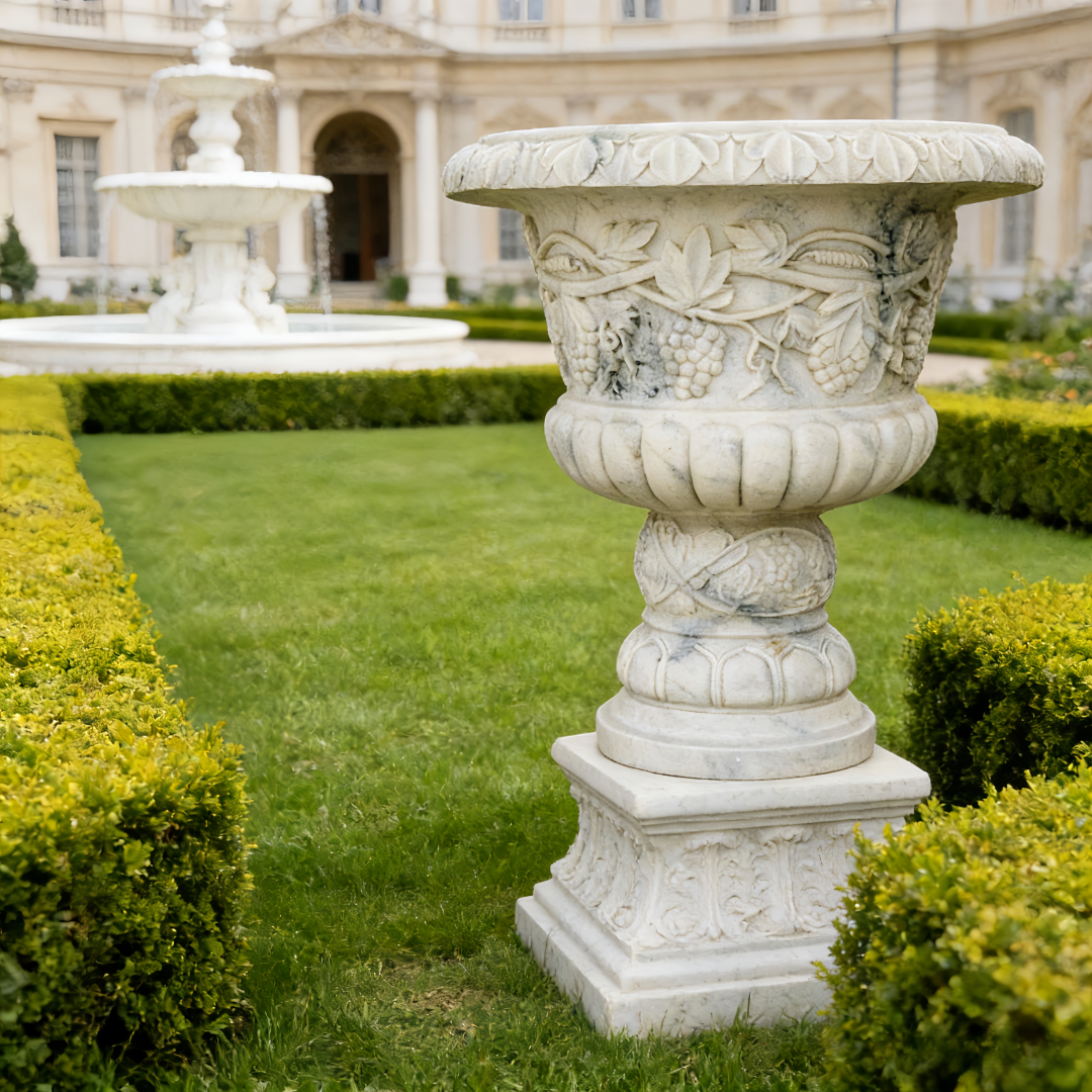 Ornate Marble Garden Planter on Manicured Lawn with Fountain Backdrop