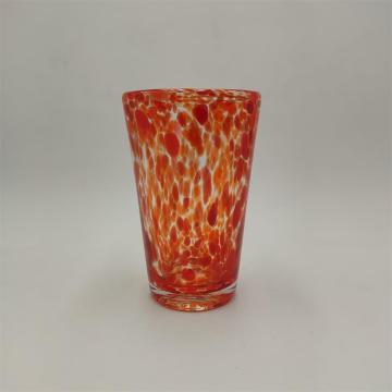 Swirled glass orange color highball glass