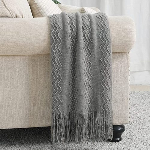 Бросьте одеяло текстурировать твердое мягкое декоративное вязаное одеяло