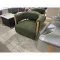 fauteuil minimaliste en laine vert olive arrondi pour le salon