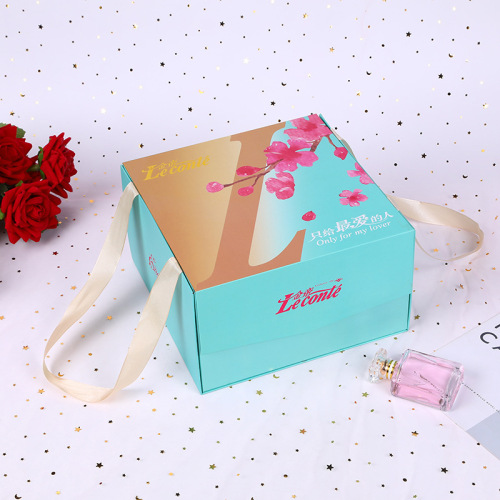 Caja de imán de empaque cosmético de lujo con mango de cinta