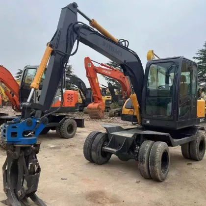 Affordable Second-Hand Xinyuan 75W Wheel Excavator with Wood Grabber for Sale