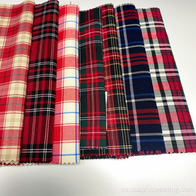 Pantalón de mujer elástico con tejido de tartán escocés teñido por urdimbre