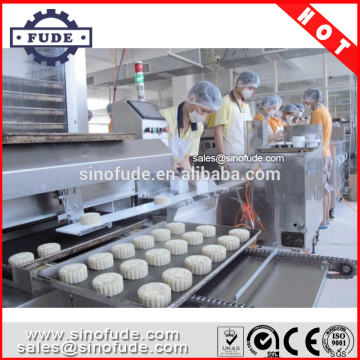Encrusting and filling machine with tray arrange machine
