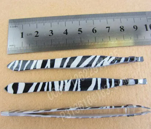 tweezer with coating