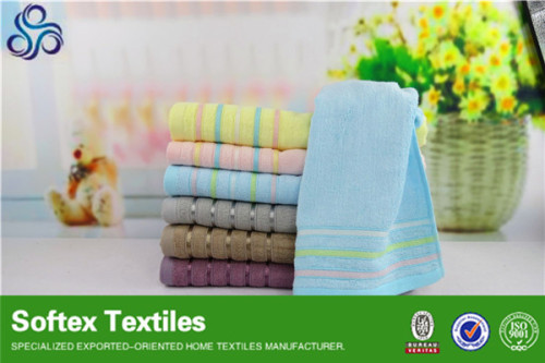 wholesale 100% cotton cheap jacquard solid color towel 2014 new design cheap bulk towel factory in china