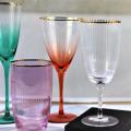 ribbed champagne glass set with gold rim