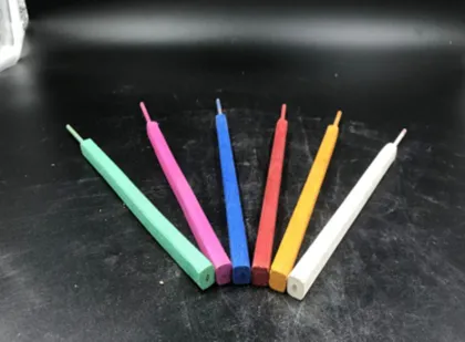 The incense stick burns in the bath