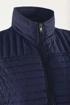 Navy quilted light vest with stand collar