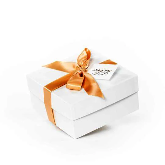 Small white wedding bridesmaid gift box with ribbon