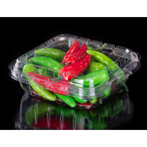 Boîte en plastique de clamshell avec légumes