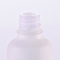 White glass lotion bottle with pump