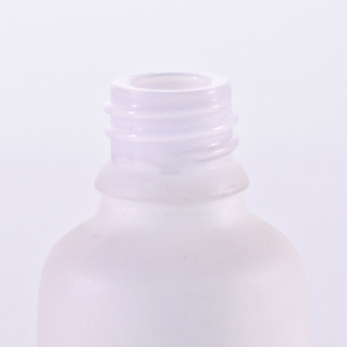 White glass lotion bottle with pump