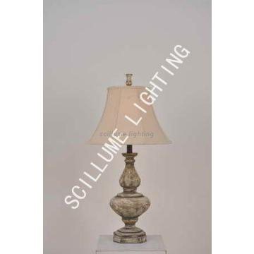 Antique style wooden table lamp with linen shade for indoor use