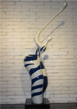 modern fiberglass painted sculpture, white and black sculpture