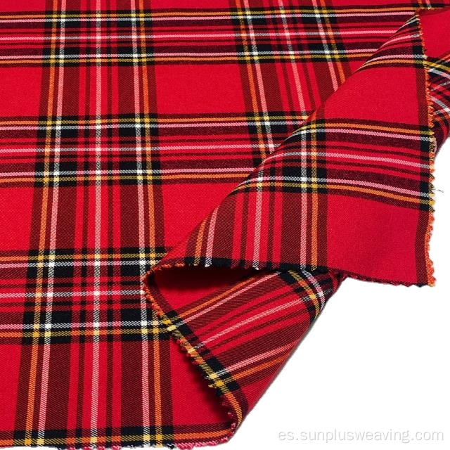 Bonitos pantalones de señora de tela bengalina teñida en rojo escocés