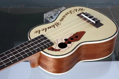 Custom lettering rosewood ukulele