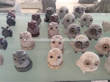 stone owl sculpture