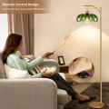 Green glass lampshade adjustable height floor lamp