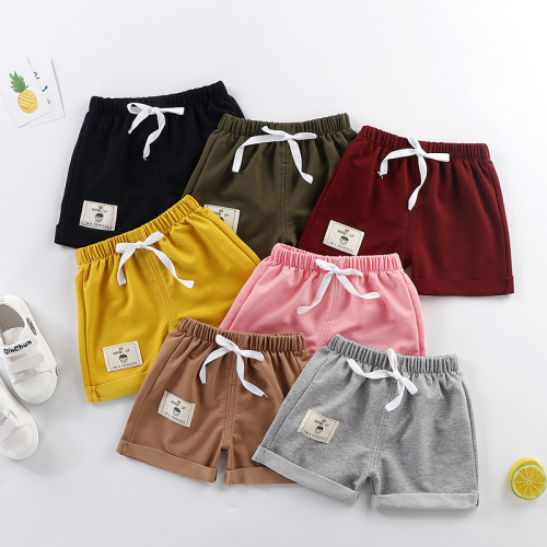 Pantalones cortos de deportes de algodón pantalones para niños