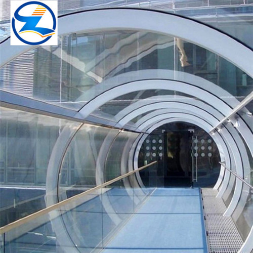 Bent double toughened laminated glass panels