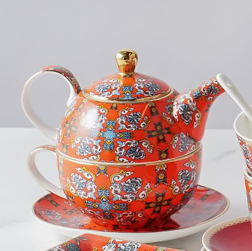 Set di tè in ceramica di decalcomania di fiore blu di fabbrica con bordo d'oro