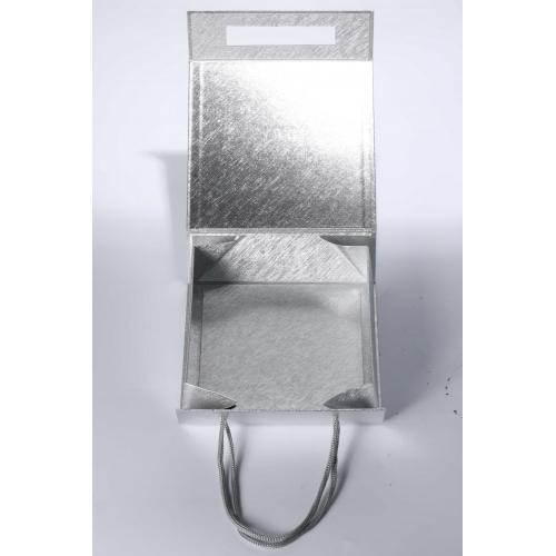 empty silver cardboard perfume package box