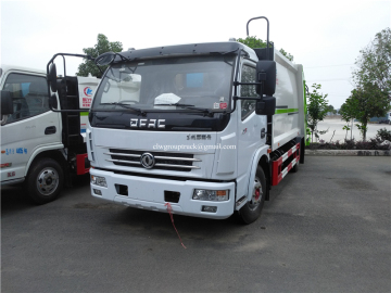 Compactor garbage truck with bin for truck