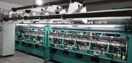 Raschel machine for warp knitting