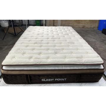 Matelas à printemps de poche beige en haut