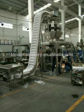 food grade inclined belt conveyor for packaging system with working platform and finished product conveyor