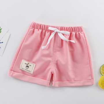 Pantalones cortos de deportes de algodón pantalones para niños