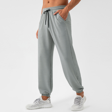 Anpassbare Männer -Jogger mit Tasche: Streetwear -Stil -Jogginghosen und ausgestellte Schweißhosen