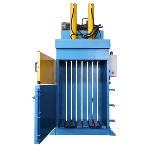 Vertical hydraulic baler machine