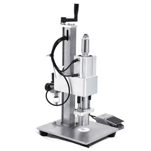 Máquina selladora de tapas de viales