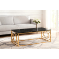 Mesa de centro con diseño de mármol negro y marco dorado